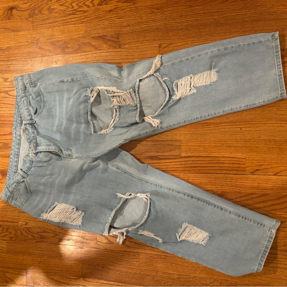 Light blue ripped plus size women’s jean .